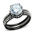 Ion plated black engagement ring with a large center stone and sparkling side accents