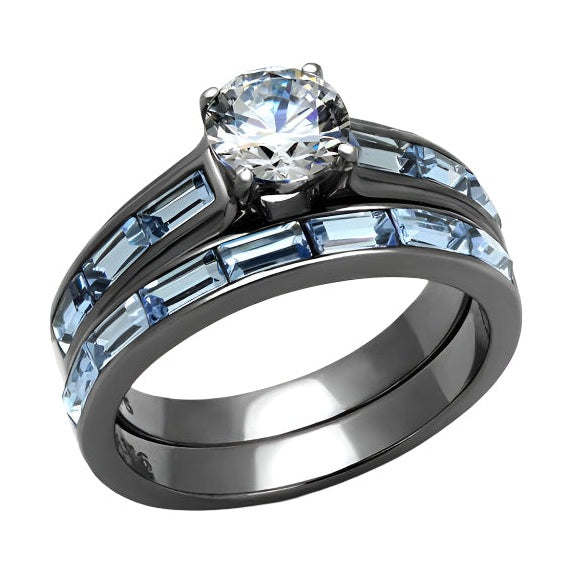 IP gun color engagement ring featuring a sparkling center stone and blue accent gems