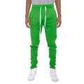 Men in Kelly Green Slim Track Pants with Elastic Waist and White Drawstring for Comfortable Fit