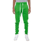 Men in Kelly Green Slim Track Pants with Elastic Waist and White Drawstring for Comfortable Fit