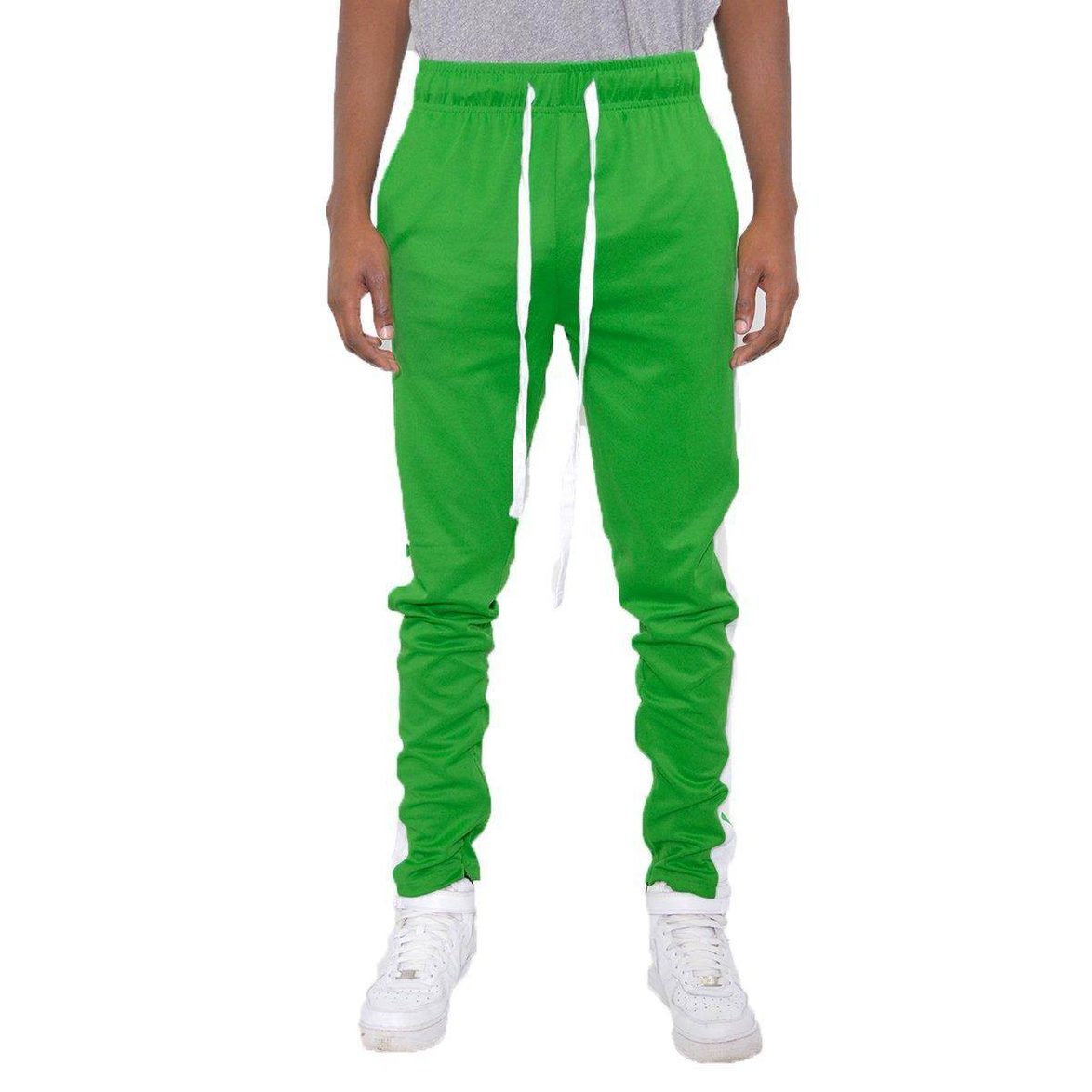 Men in Kelly Green Slim Track Pants with Elastic Waist and White Drawstring for Comfortable Fit