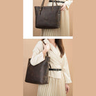 Elegant leather messenger bag for travel displayed on a model wearing a stylish outfit