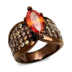 Light brown gemstone statement ring with vibrant orange center and sparkling accents