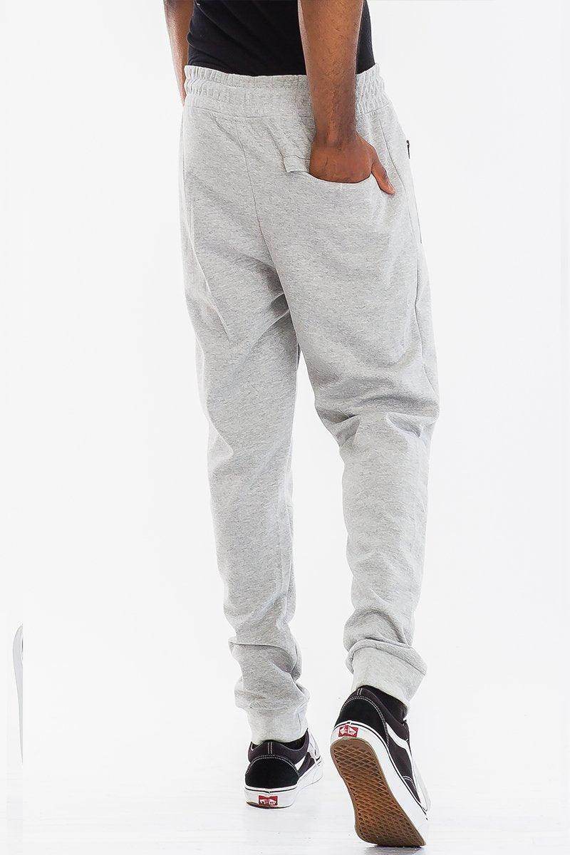 Mens light gray jogger pants with side pockets for comfort and casual style
