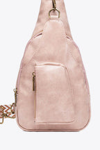 Trendsi pink PU leather sling bag with a stylish design and front zip pocket for easy access