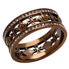 Elegant light rose gemstone ring with intricate cross designs and a polished finish