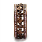 Elegant light rose gemstone ring with intricate cross design and sparkling accents for women's jewelry