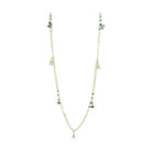 Elegant long matte gold necklace for travel featuring decorative green accents and a unique design