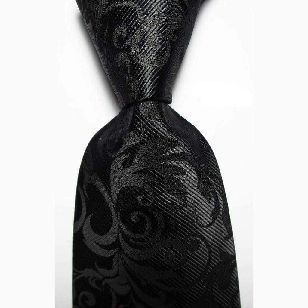 Luxury black silk tie with an intricate pattern for formal and elegant occasions