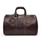 Luxury business travel bag in rich brown leather with sturdy handles and stylish design