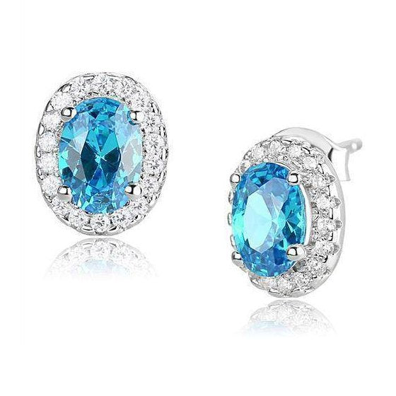 Stunning luxury sterling silver jewelry for women featuring oval blue gemstone earrings with sparkling accents
