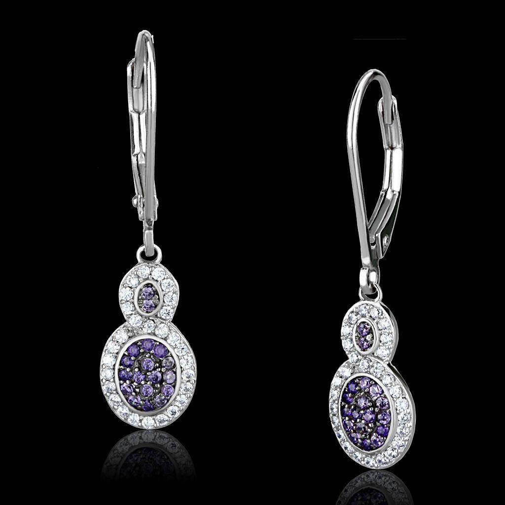 Luxury vacation jewelry for women, featuring elegant silver earrings with sparkling purple gemstones