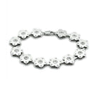 Matte rhodium fashion bracelet with floral design and sparkling crystal accents for stylish accessories