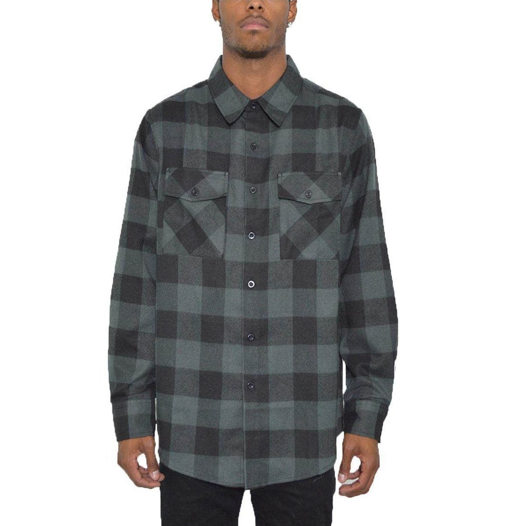Men's checkered flannel shirt in dark green and black with button-up front and two chest pockets