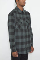 Men's checkered flannel shirt in black and gray with button-up design and two chest pockets