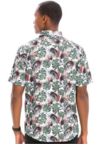 Men's Green Palm Shirt featuring a vibrant tropical pattern with palm leaves and floral accents