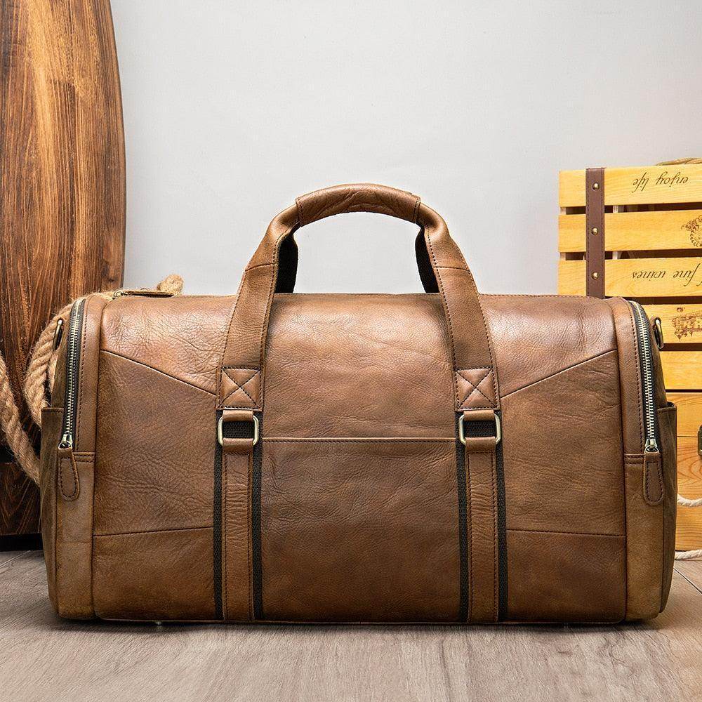Mens large travel duffel from VacationGrabs in sturdy brown leather with ample storage capacity