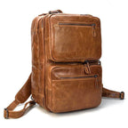 VacationGrabs mens leather laptop backpack in brown with multiple compartments for organization