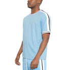 Mens light blue striped shirt with sporty black and white accents for casual wear