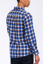 Men's plaid flannel shirt from VacationGrabs in blue and brown checkered pattern, featuring a classic fit