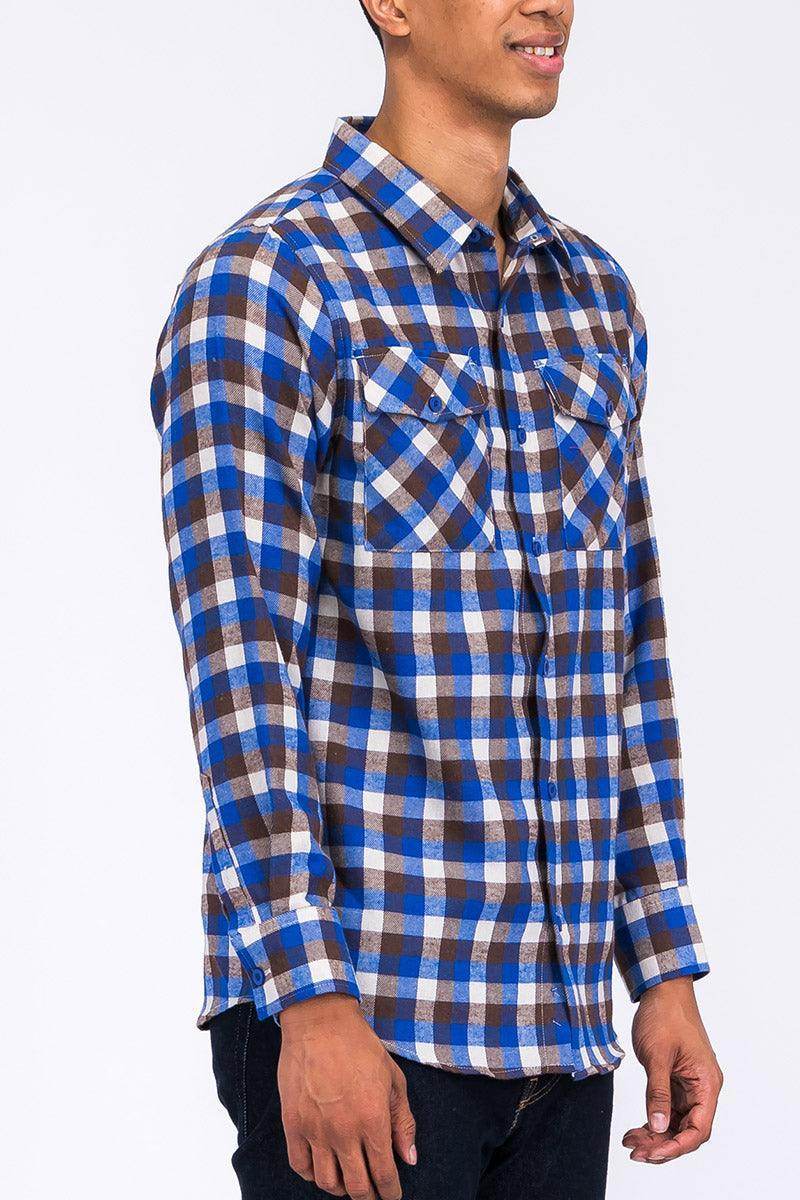 Men's plaid flannel shirt in blue and brown tones with two front pockets and long sleeves