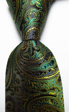 Richly patterned green and gold men's silk neckties with a paisley design from VacationGrabs