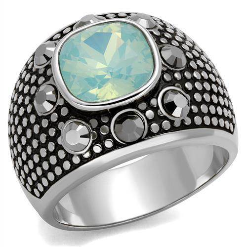 Stylish mens vacation jewelry ring featuring a large aquamarine stone and intricate black detailing