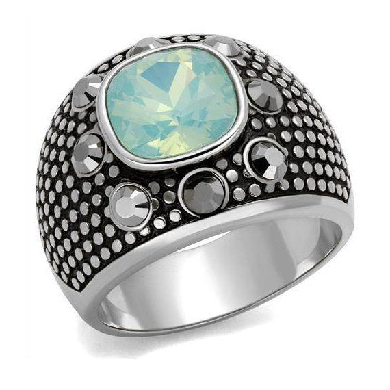 Stylish mens vacation jewelry ring featuring a large aquamarine stone and intricate black detailing