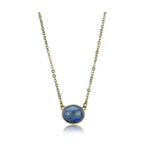 Minimalist gold chain pendant jewelry featuring a blue gemstone for elegant style