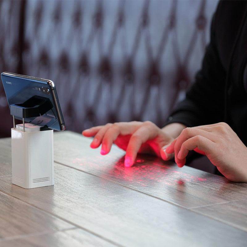 Portable gadget with holographic projection for a mobile compatible keyboard experience