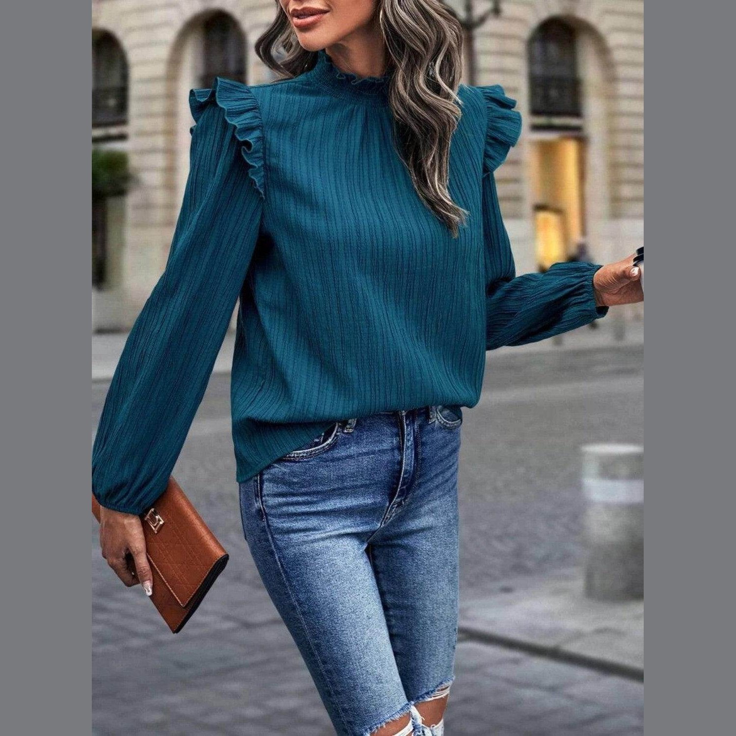 Trendsi mock neck blouse for travel with ruffled sleeves in teal, styled with distressed denim jeans