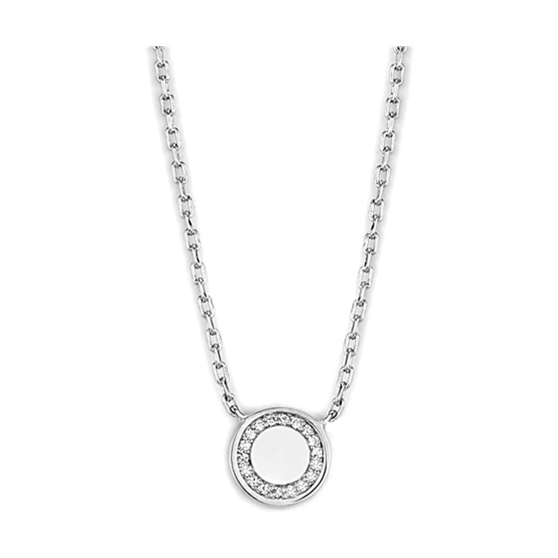Elegant silver necklace with a circular pendant, perfect modern jewelry for vacation outfits