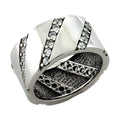 Stylish modern silver ring for women featuring a unique design and sparkling accents