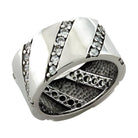 Stylish modern silver ring for women featuring a unique design and sparkling accents