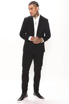 Men's modern slim fit trousers black paired with a sleek blazer and formal shirt for a stylish look