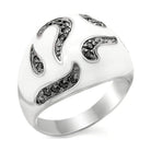 Modern sterling silver cocktail ring featuring artistic wave designs and sparkling black accents