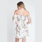 Ivory Felix off shoulder floral romper with smocked bodice and stylish tie details