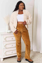 Trendsi open front cardigan for travel in cream, stylishly paired with brown corduroy pants