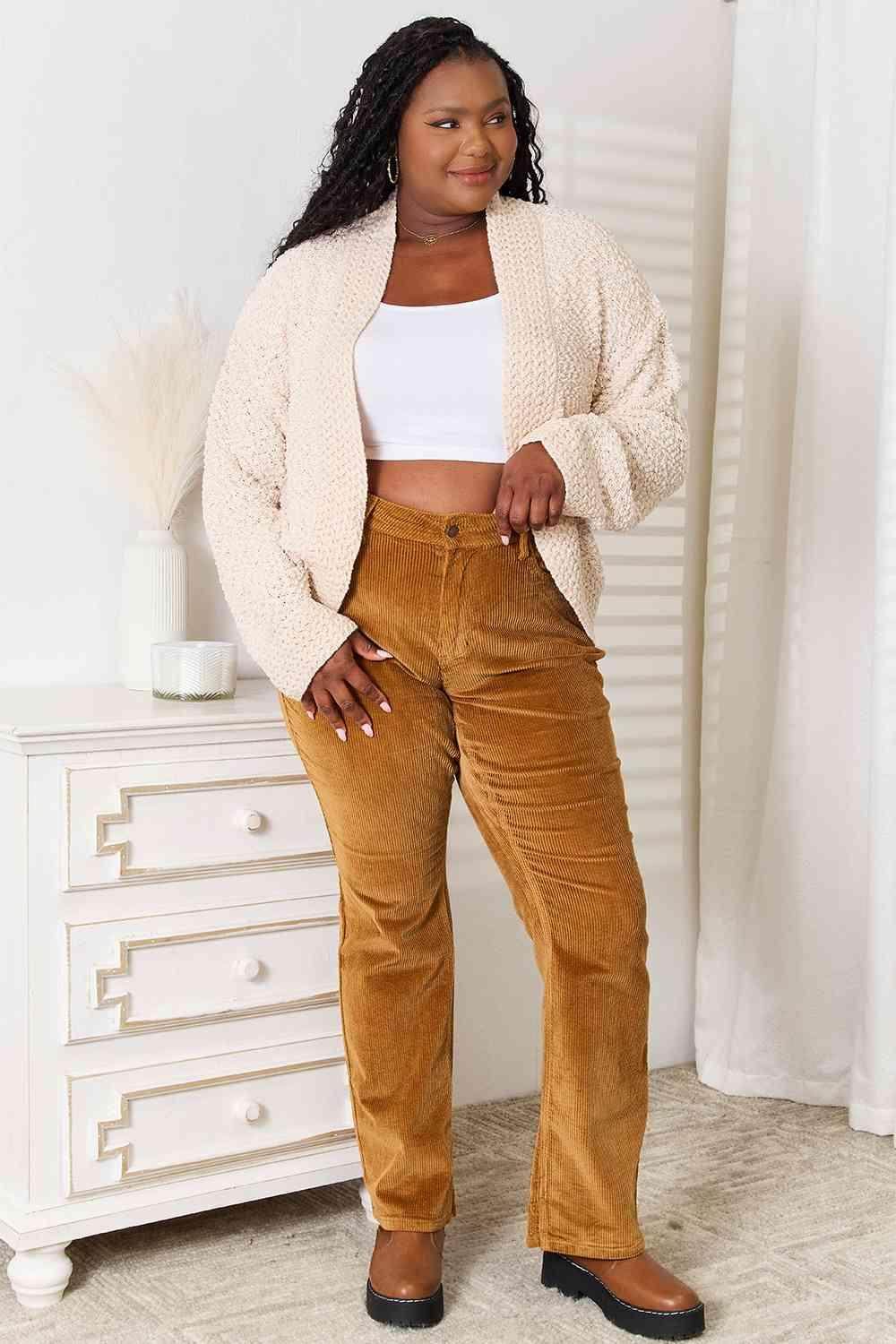 Trendsi open front cardigan for travel in cream, stylishly paired with brown corduroy pants