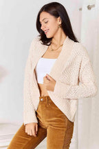 Trendsi open front cardigan for travel in soft beige with a stylish textured design