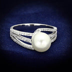 Elegant pearl silver ring for women with sparkling accents and a modern twisted design