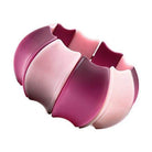 Pink resin statement bracelet from VacationGrabs featuring a unique wavy design