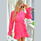 Trendsi pink vacation dress with long sleeves and a stylish wrap design for summer outings