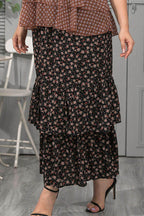 Trendsi plus size floral maxi skirt with layered ruffles and a vibrant floral pattern