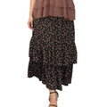 Trendsi plus size floral maxi skirt with tiered ruffles and a black background, perfect for summer outings