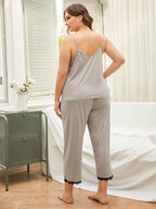 Cozy plus size lace pajama set with a comfortable tank top and cropped pants for relaxing at home