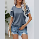 Trendsi Women's pom-pom flutter sleeve tee in gray, paired with denim shorts for a stylish summer look