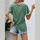 Back view of Women's Trendsi pom-pom flutter sleeve tee in green with stylish detail