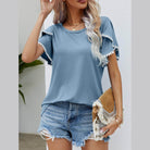 Trendsi Women's pom-pom flutter sleeve tee in blue, styled with denim shorts and a clutch bag
