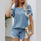 Trendsi Women's pom-pom flutter sleeve tee in blue, styled with denim shorts and a clutch bag